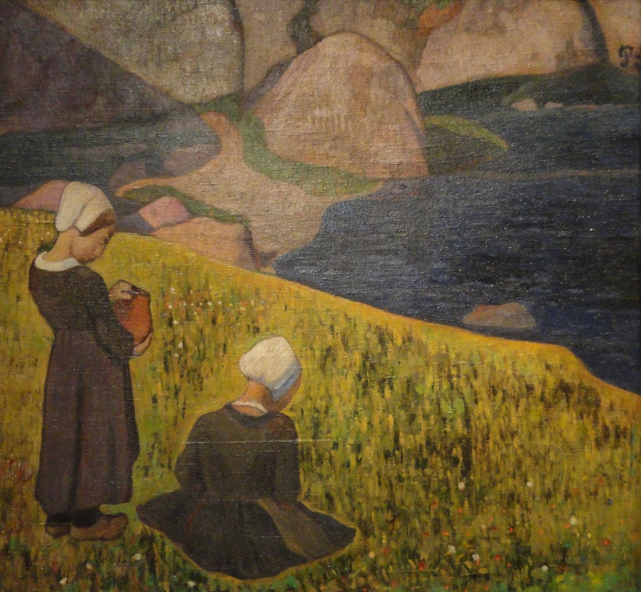 Mulheres bretãs em um campo à beira-mar de Paul Gauguin