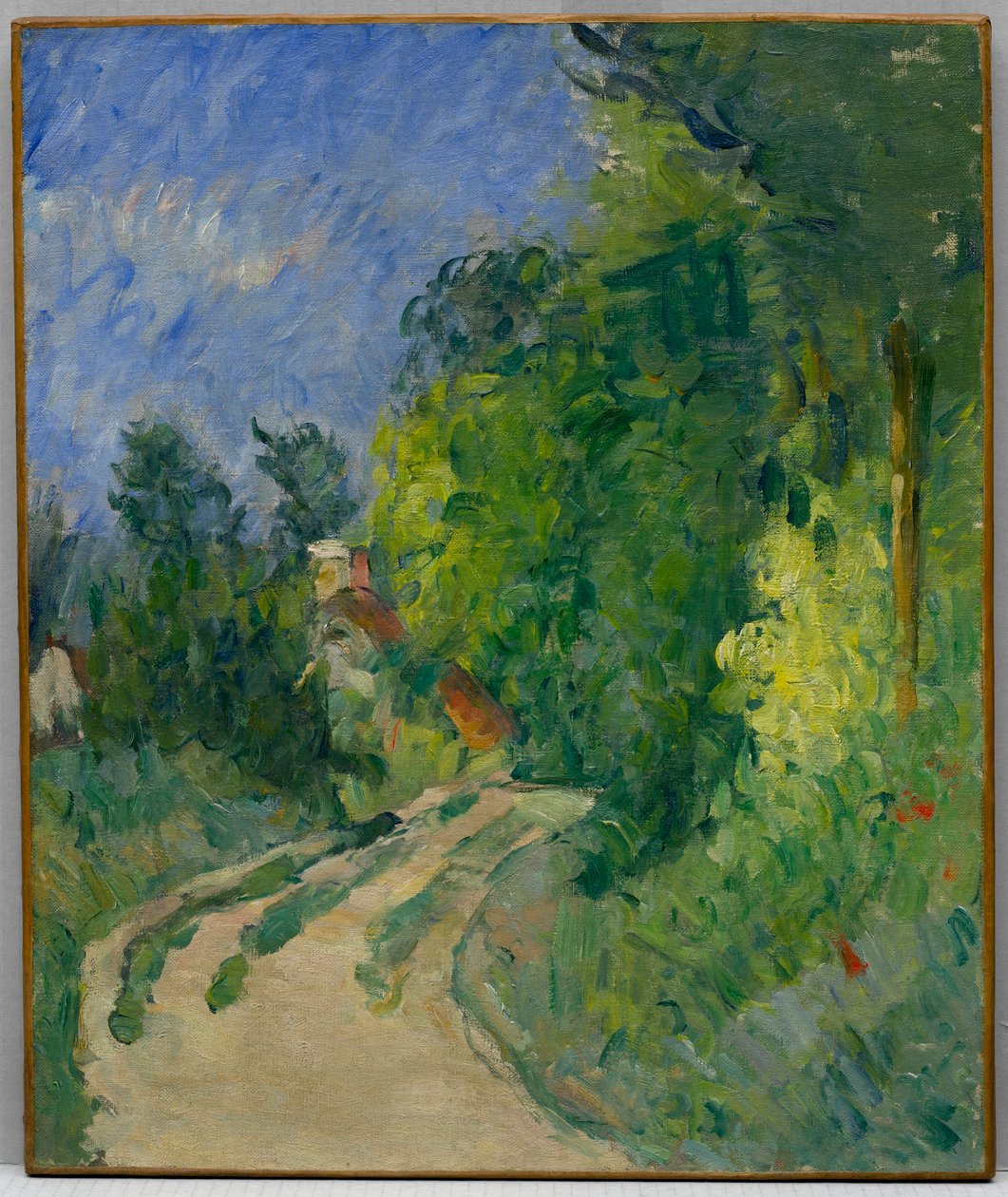 La Route tournante na vegetação rasteira de Paul Cézanne