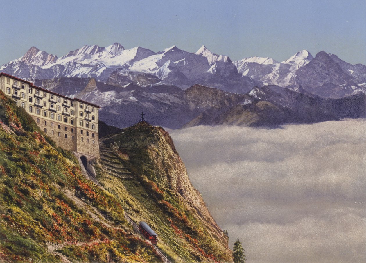 Teleférico de Stanserhorn 1900m e hotel com os Alpes Berneses (fotografia a cores) de Photographer Swiss