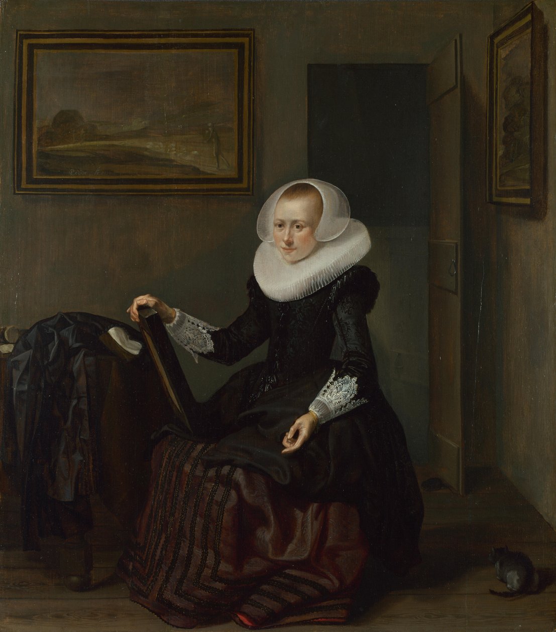 Uma mulher segurando um espelho, 1625 de Pieter Codde