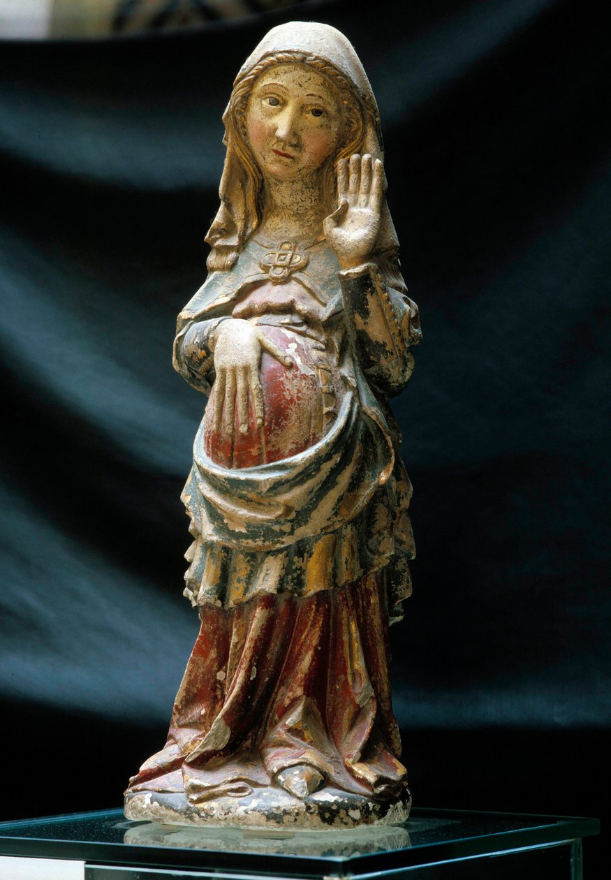 Arte portuguesa: representação da Virgem grávida com uma mão na barriga. Escultura em pedra policromada de Portuguese School