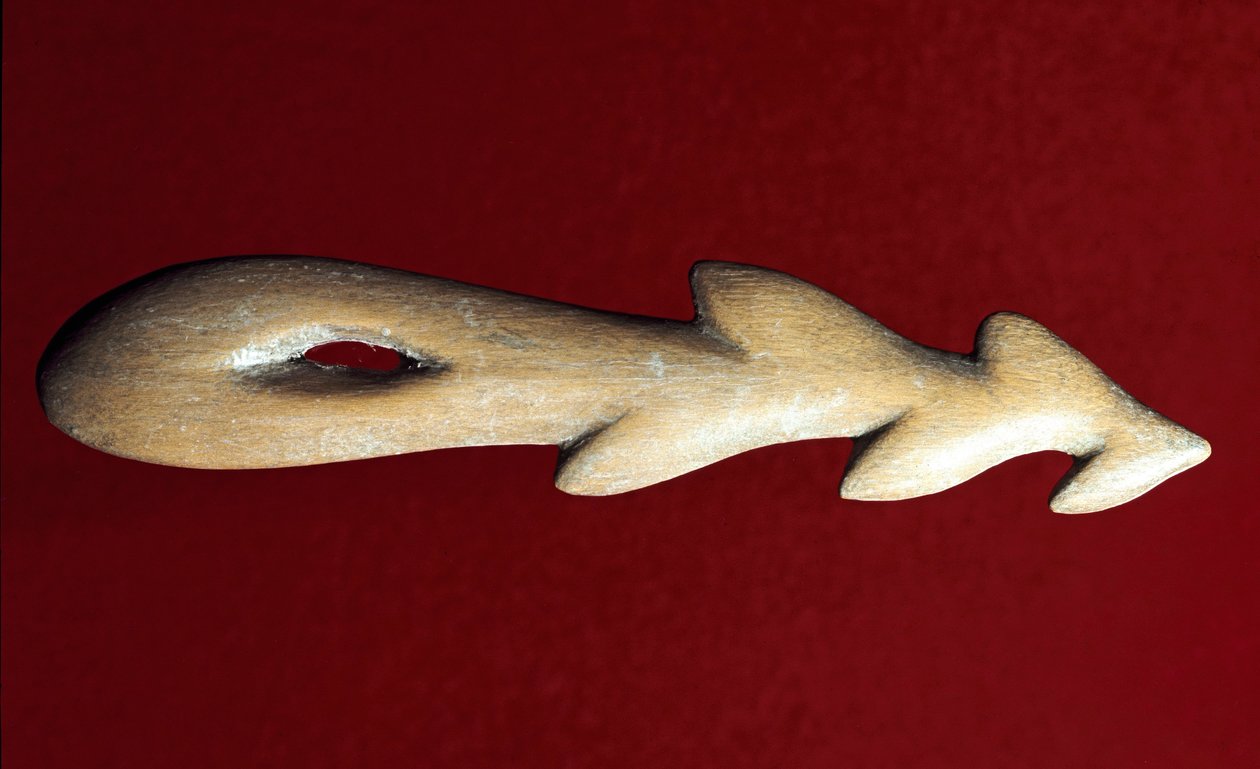 Pré-história: arpão ósseo usado para a pesca. Cultura do Magdaleniano, Paleolítico Superior. Verona, Museo Civico di Storia Naturale de Prehistoric Prehistoric