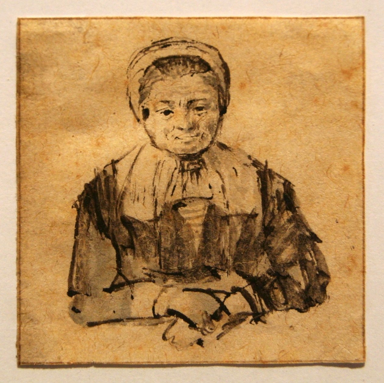 Mulher velha com as mãos postas de Rembrandt van Rijn