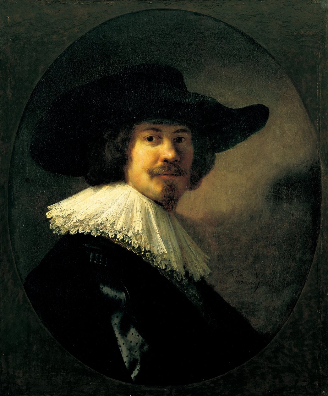 Retrato de um homem com um chapéu de abas largas de Rembrandt van Rijn