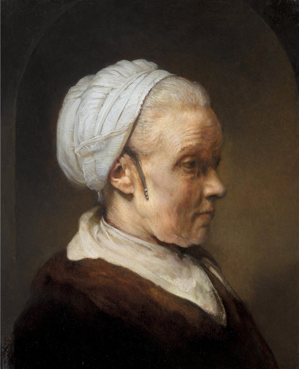 Estudo de uma mulher idosa em um boné branco de Rembrandt van Rijn