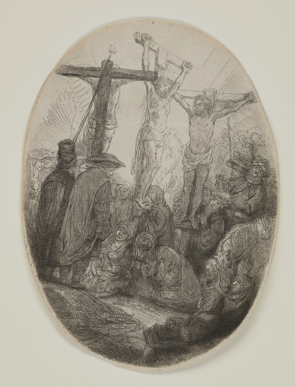 Cristo crucificado entre dois ladrões: uma placa oval, c.1641 (gravura e ponta seca) de Rembrandt van Rijn