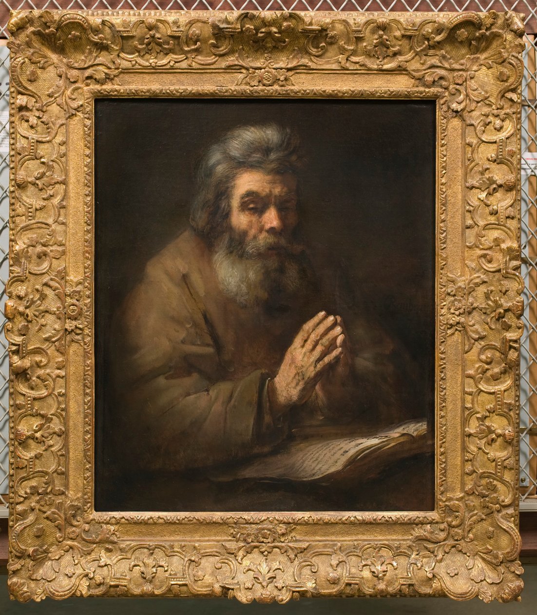 Um homem barbudo usando um chapéu, c. 1655-1660. de Rembrandt van Rijn