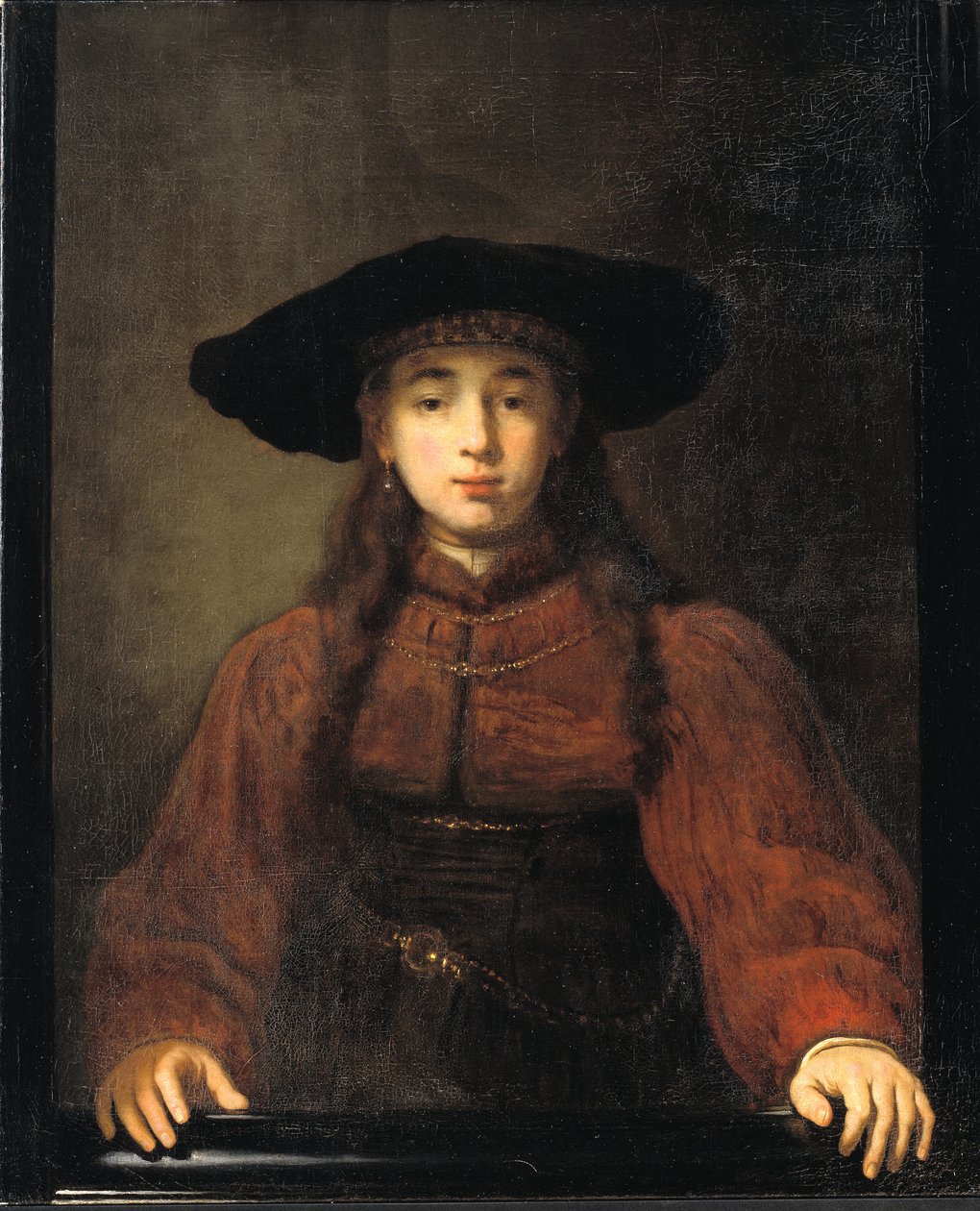 Uma jovem descansando as mãos no porta-retrato de Rembrandt van Rijn