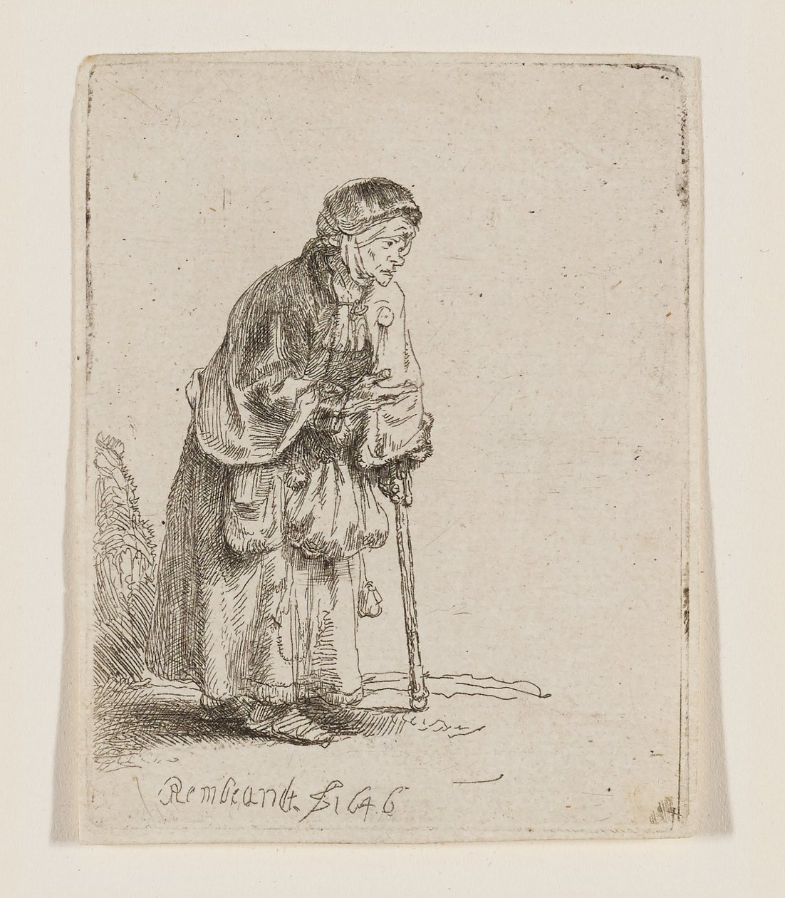 Mulher mendiga apoiada num bastão de Rembrandt van Rijn