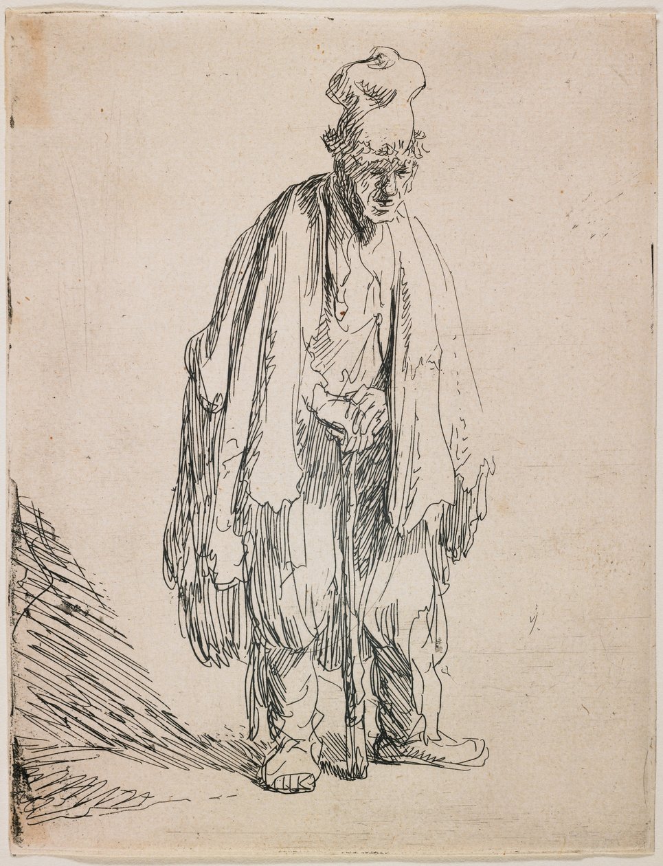 Mendigo com boné de pala alta, apoiado numa bengala de Rembrandt van Rijn