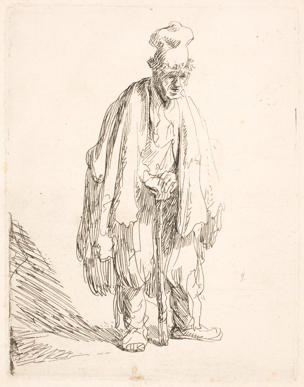 Mendigo com um chapéu de abas largas, de pé e apoiado numa bengala de Rembrandt van Rijn