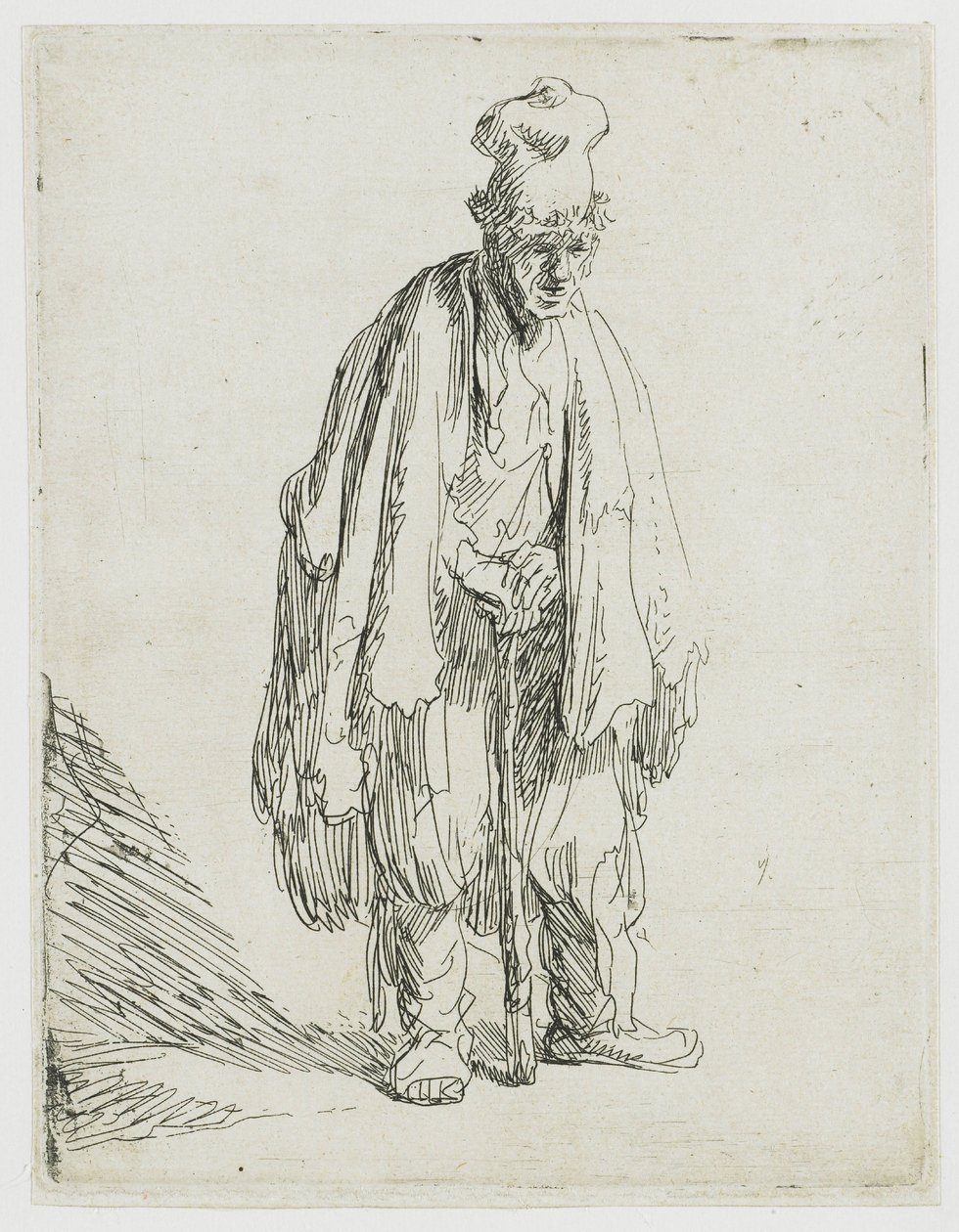 Mendigo com um chapéu de abas largas, de pé e apoiado numa bengala de Rembrandt van Rijn
