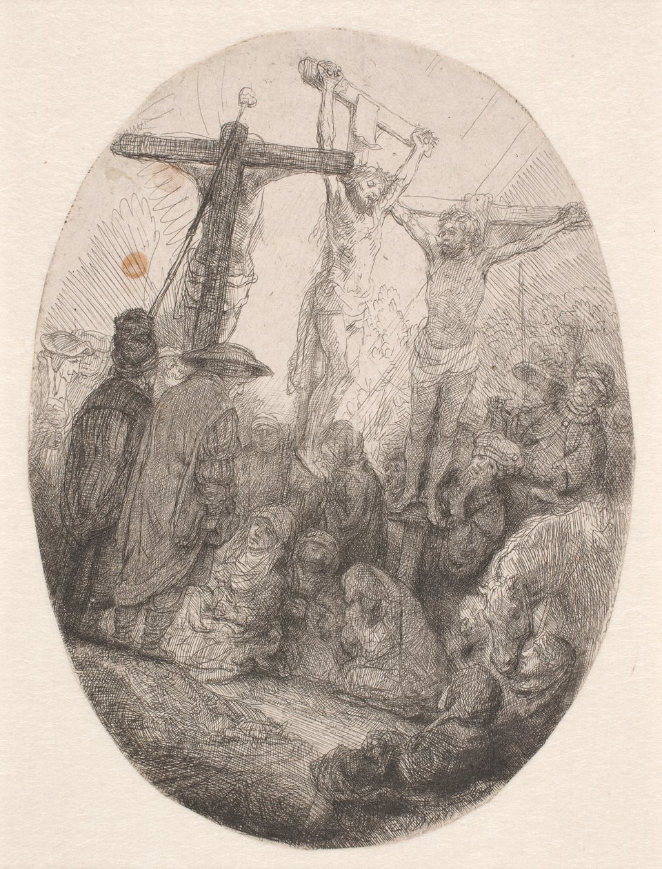 Cristo crucificado entre os dois ladrões: uma placa oval de Rembrandt van Rijn