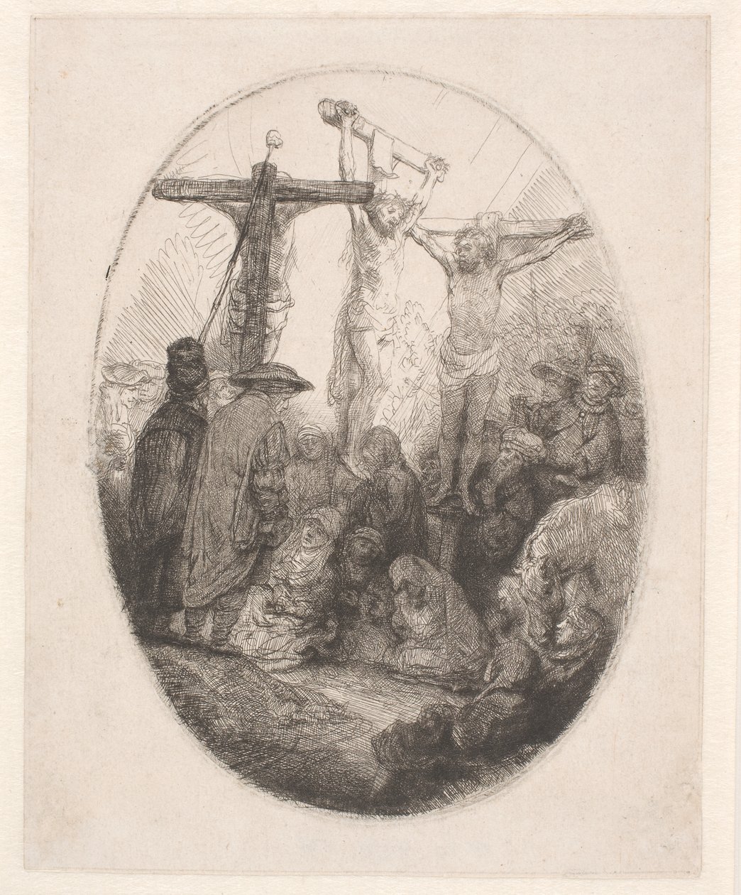 Cristo crucificado entre os dois ladrões: uma placa oval de Rembrandt van Rijn