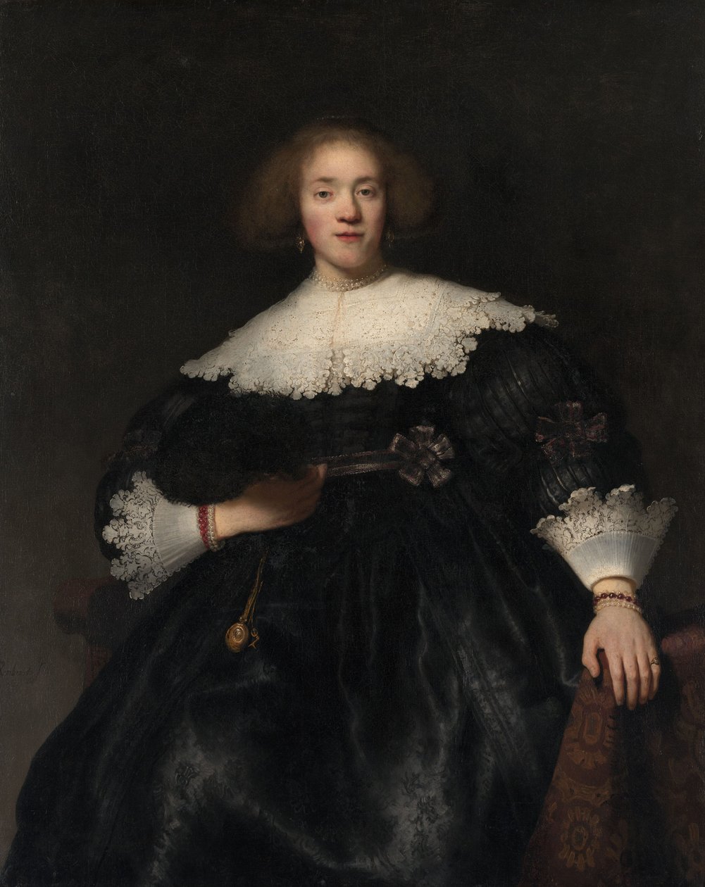 Retrato de uma jovem mulher com uma fã, 1633 de Rembrandt van Rijn