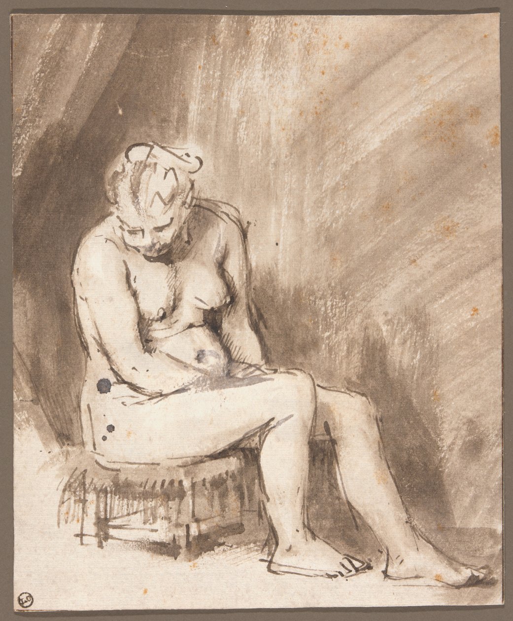 Nu feminino sentado de Rembrandt van Rijn