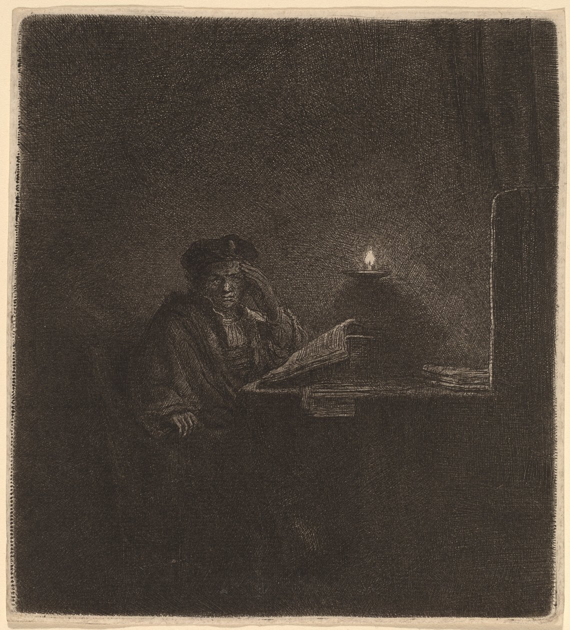 Estudante em uma mesa à luz de velas de Rembrandt van Rijn