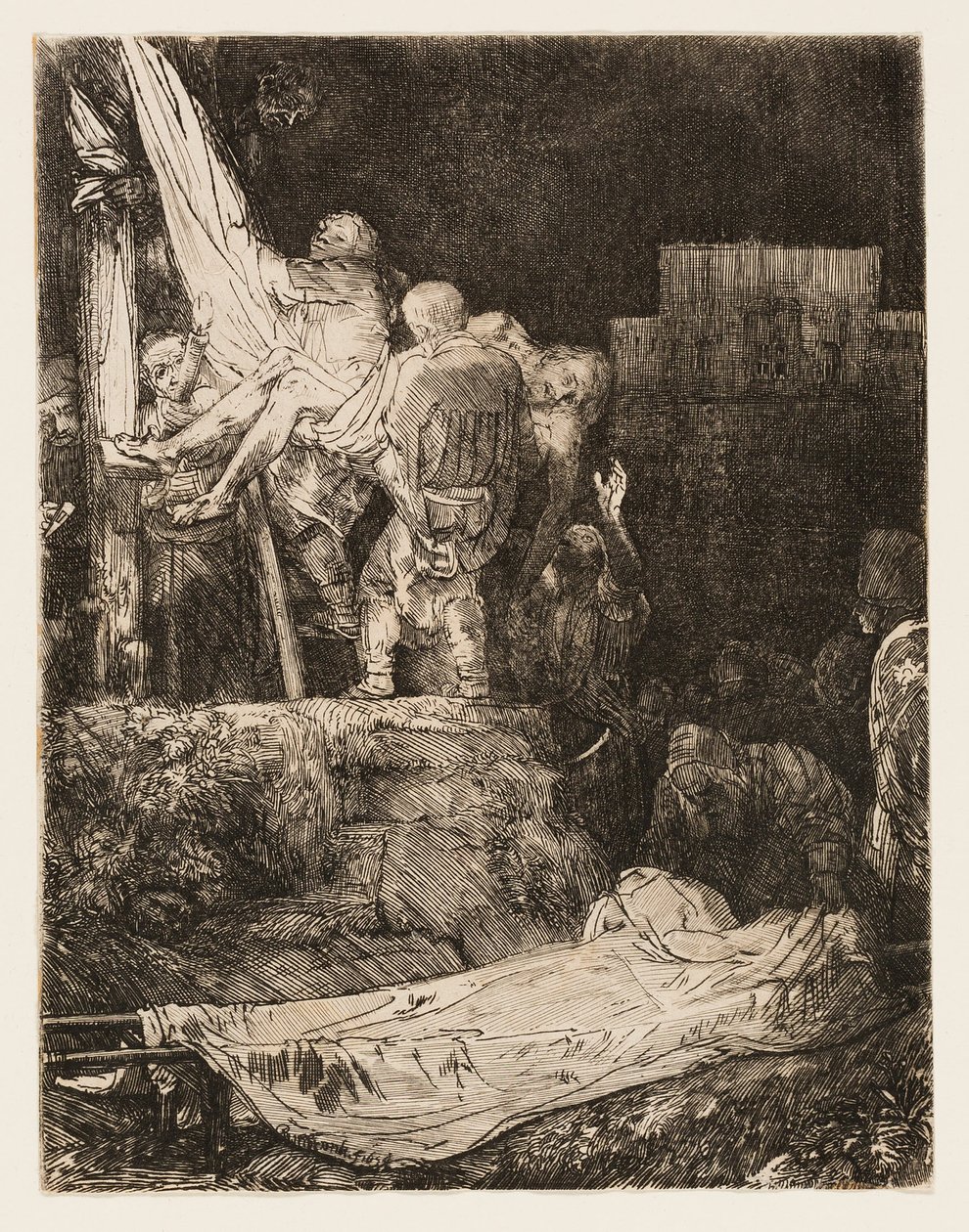 A descida da cruz à luz de tochas de Rembrandt van Rijn