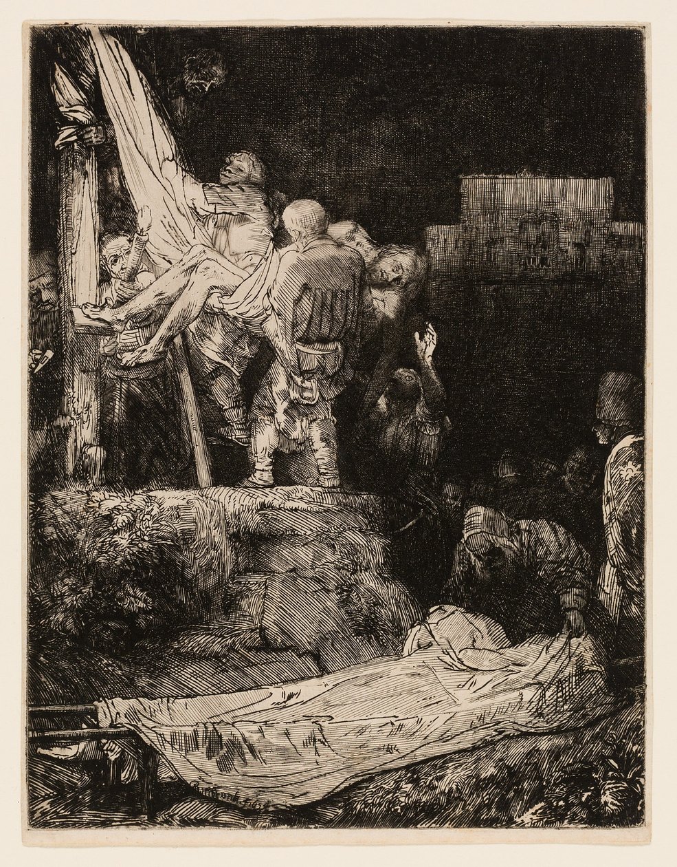 A descida da cruz à luz de tochas de Rembrandt van Rijn