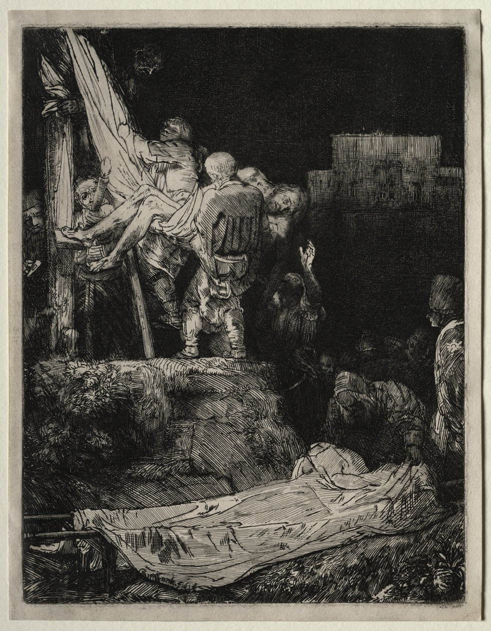 A descida da cruz à luz de tochas de Rembrandt van Rijn
