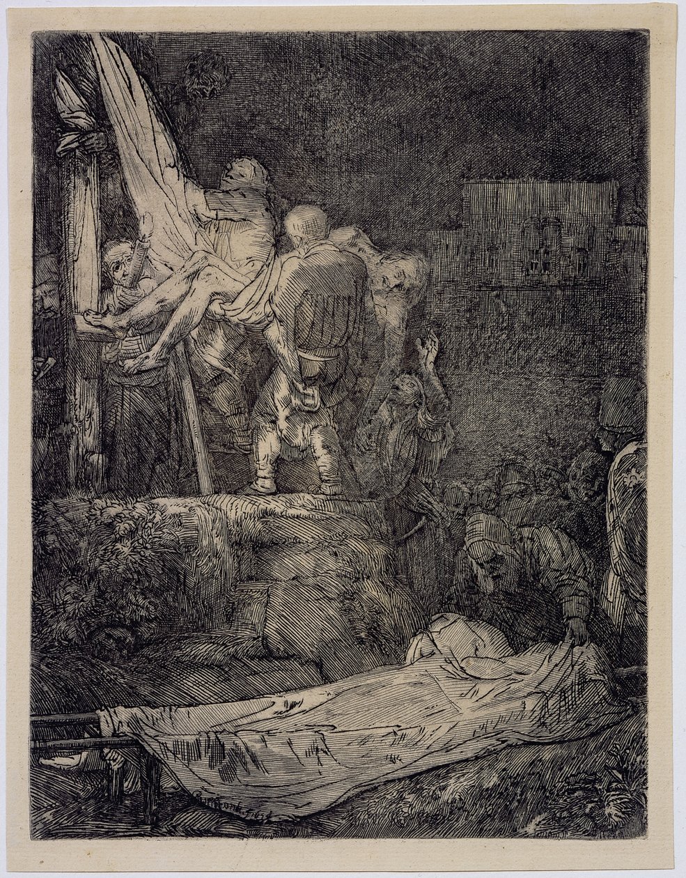 A descida da cruz à luz de tochas de Rembrandt van Rijn