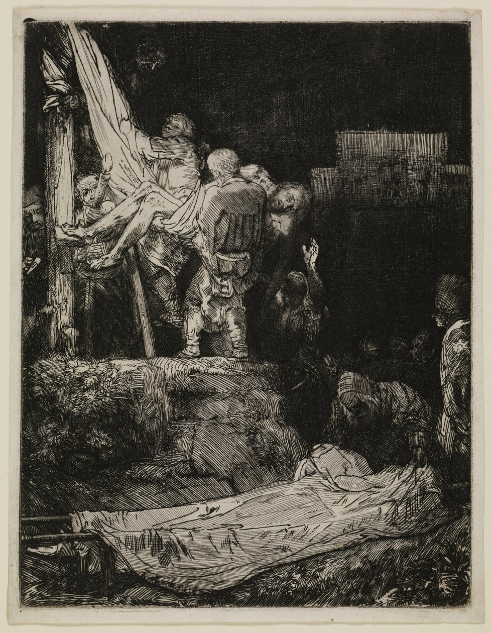 A Descida da Cruz à Luz das Tochas de Rembrandt van Rijn