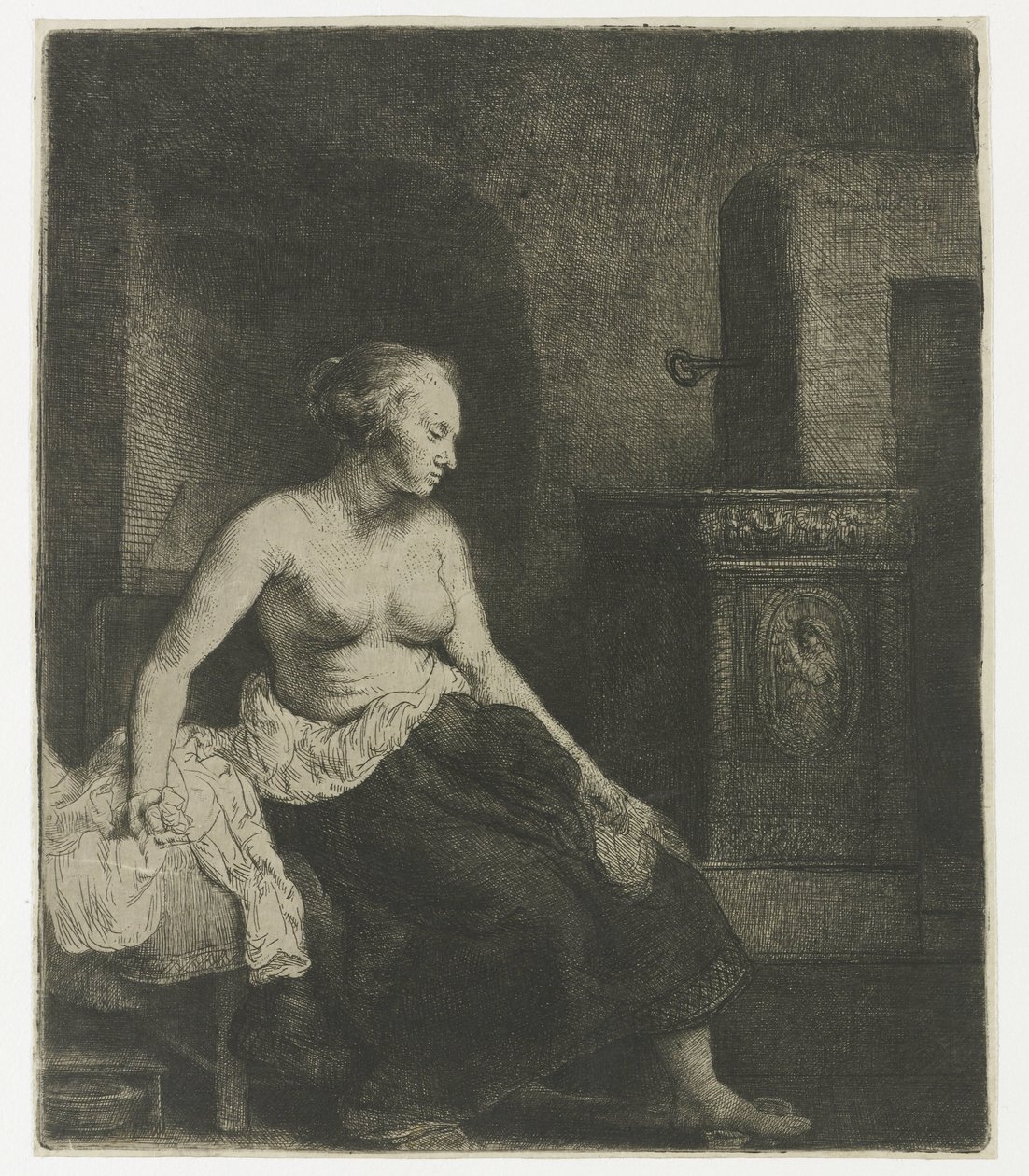 Mulher sentada meio vestida ao lado de um fogão de Rembrandt van Rijn
