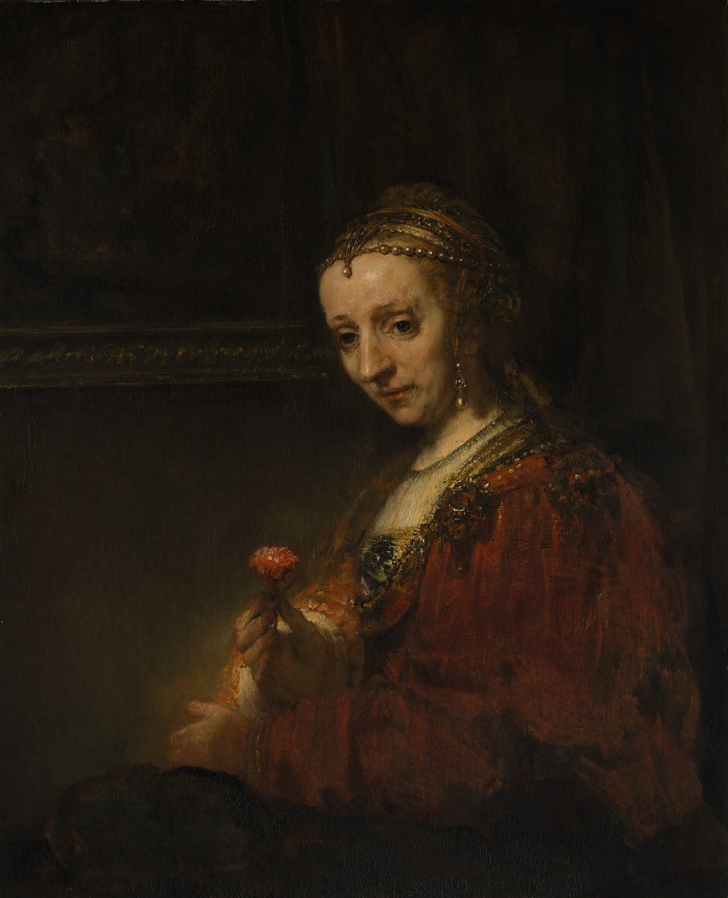 Mulher com um rosa, início dos anos 1660. de Rembrandt van Rijn