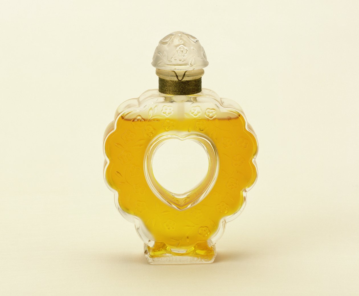 Coeur Joie, garrafa de perfume transparente fosca de Lalique para Nina Ricci de Rene Jules Lalique