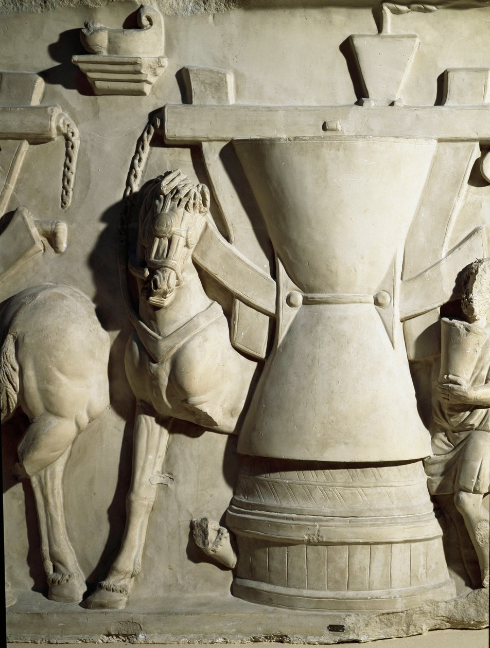 Arte romana: baixo relevo representando uma roda de moinho. Século I d.C. Roma Museo della Civilta Romana de Roman