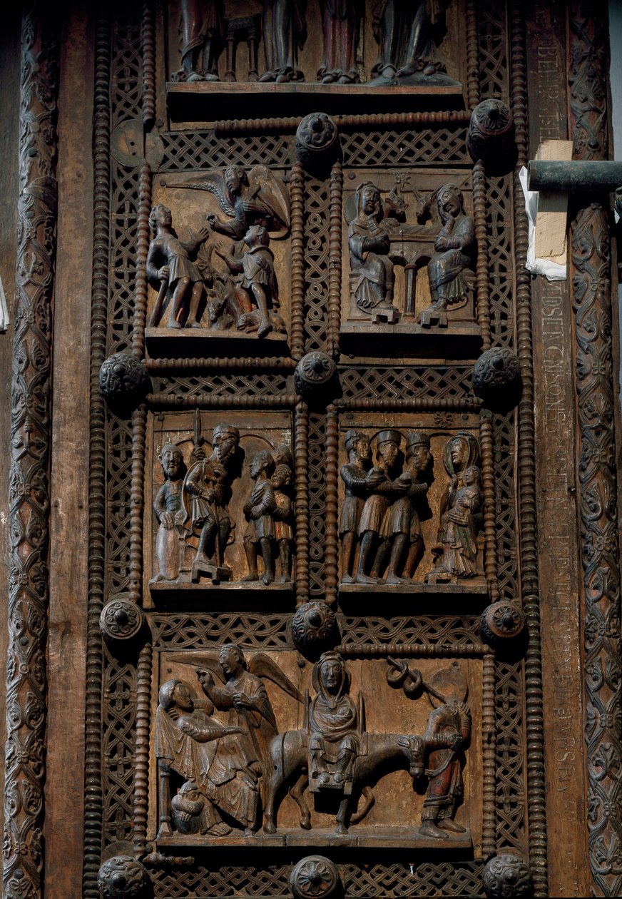 Arte românica: porta de madeira de meados do século XII da Igreja de Santa Maria do Capitólio em Colónia, Alemanha (Sankt Maria im Kapitol, Koln). Cenas que mostram o anúncio aos pastores, a natividade, a adoração dos magos e o de Romanesque