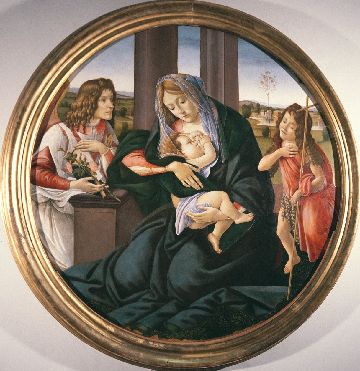 Madonna e criança com São João Batista e um anjo de Sandro Botticelli