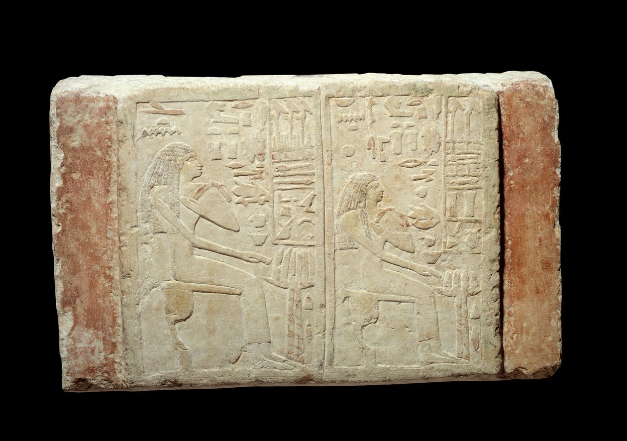 Antiquite egípcia: estela funerária em calcário das senhoras Waten e Ousernebnet. Período Thinitis (ca. 3100-2700 AC) 2ª dinastia de Memphis. Museu do Louvre de Paris de School Egyptian