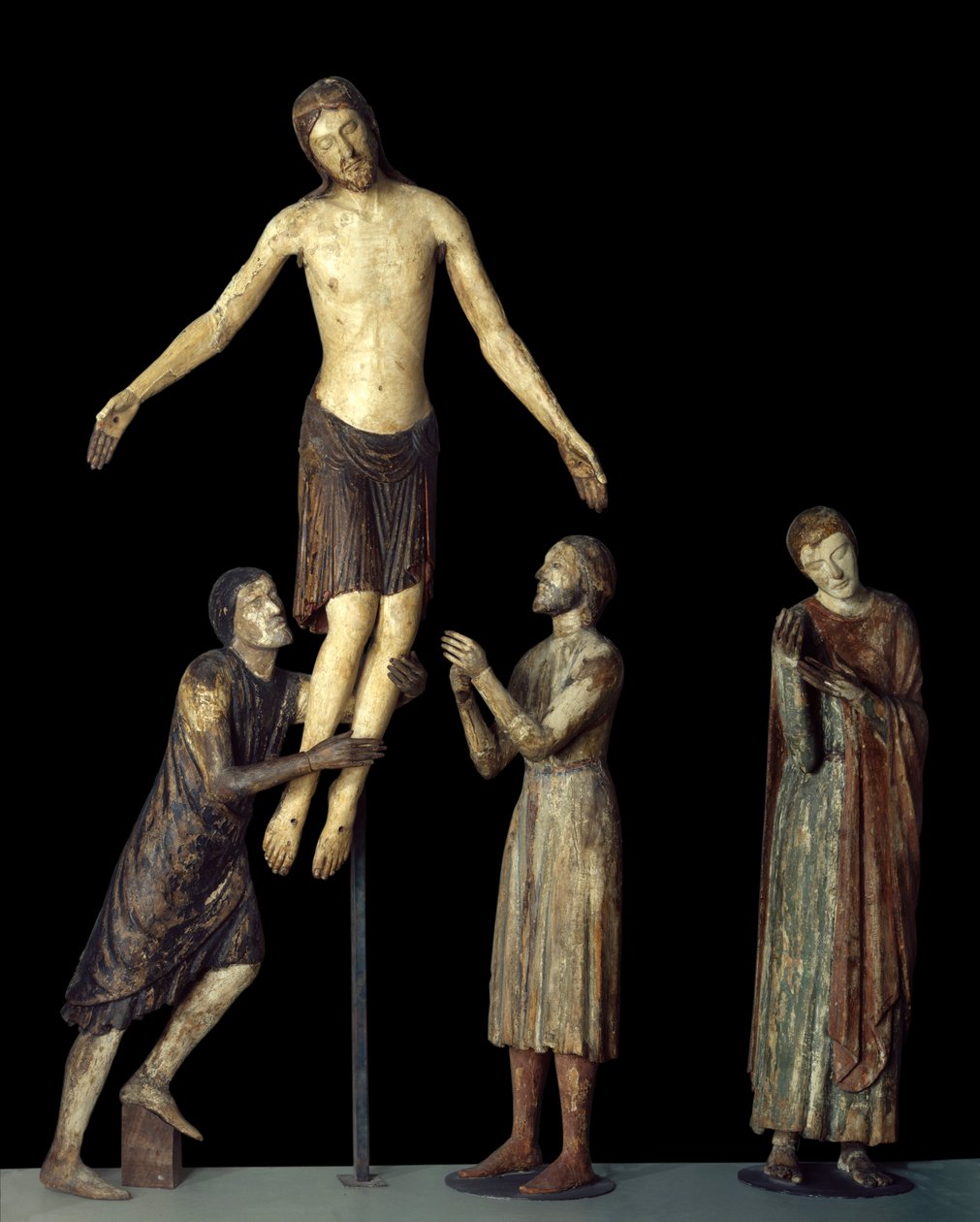 Descida cruzada. São João, São José de Arimatéia, São Nicodema ao redor de Jesus Cristo morto. Escultura em madeira. Escola Anónima Italiana da Idade Média. Paris, Museu do Louvre. de School Italian