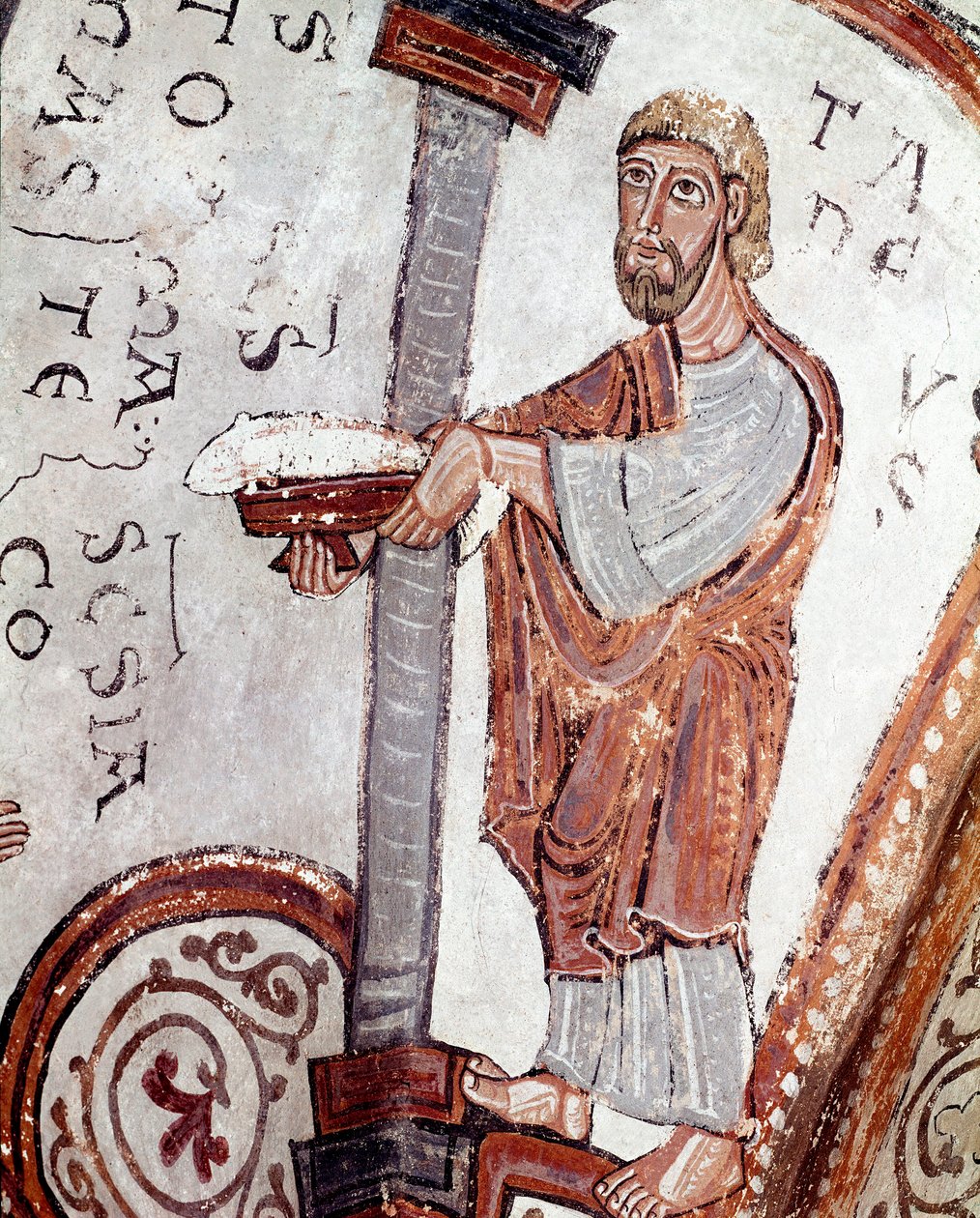 O ciclo dos meses: um criado a oferecer peixe. Pormenor de um fresco do século XII do Panteão Real da Real Colegiata de San Isidoro (Real Collegiale de Saint Isidore). Leão. Espanha de Spanish School