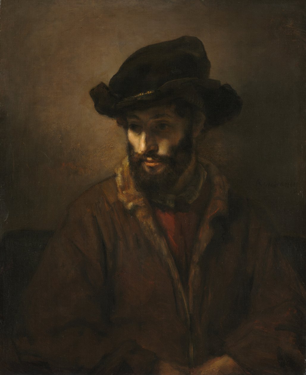 Um homem barbudo usando um chapéu de Studio of Rembrandt van Rijn