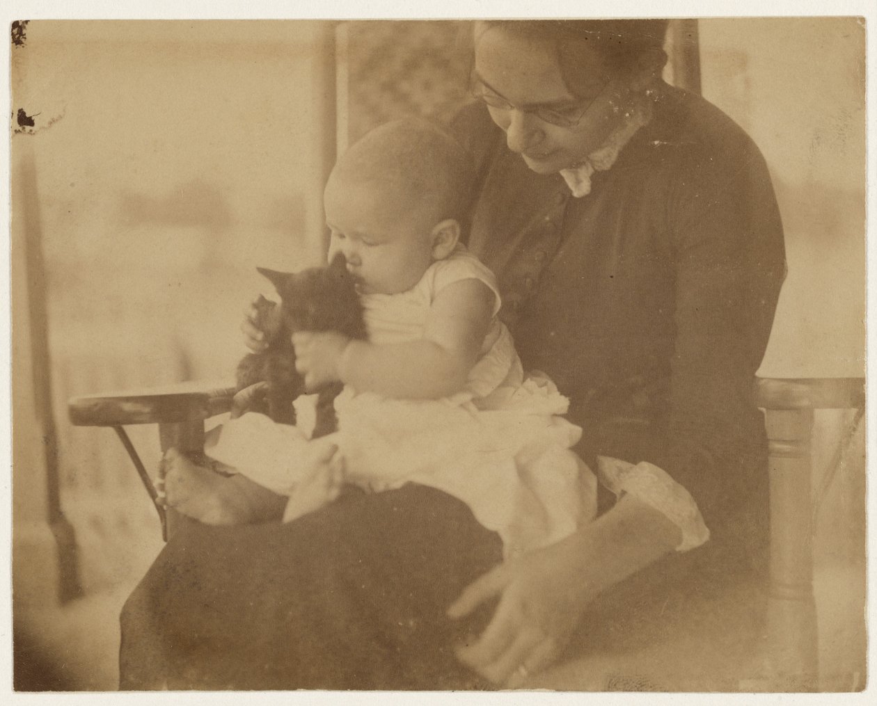 [Frances Crowell e criança com gatinho] de Thomas Eakins