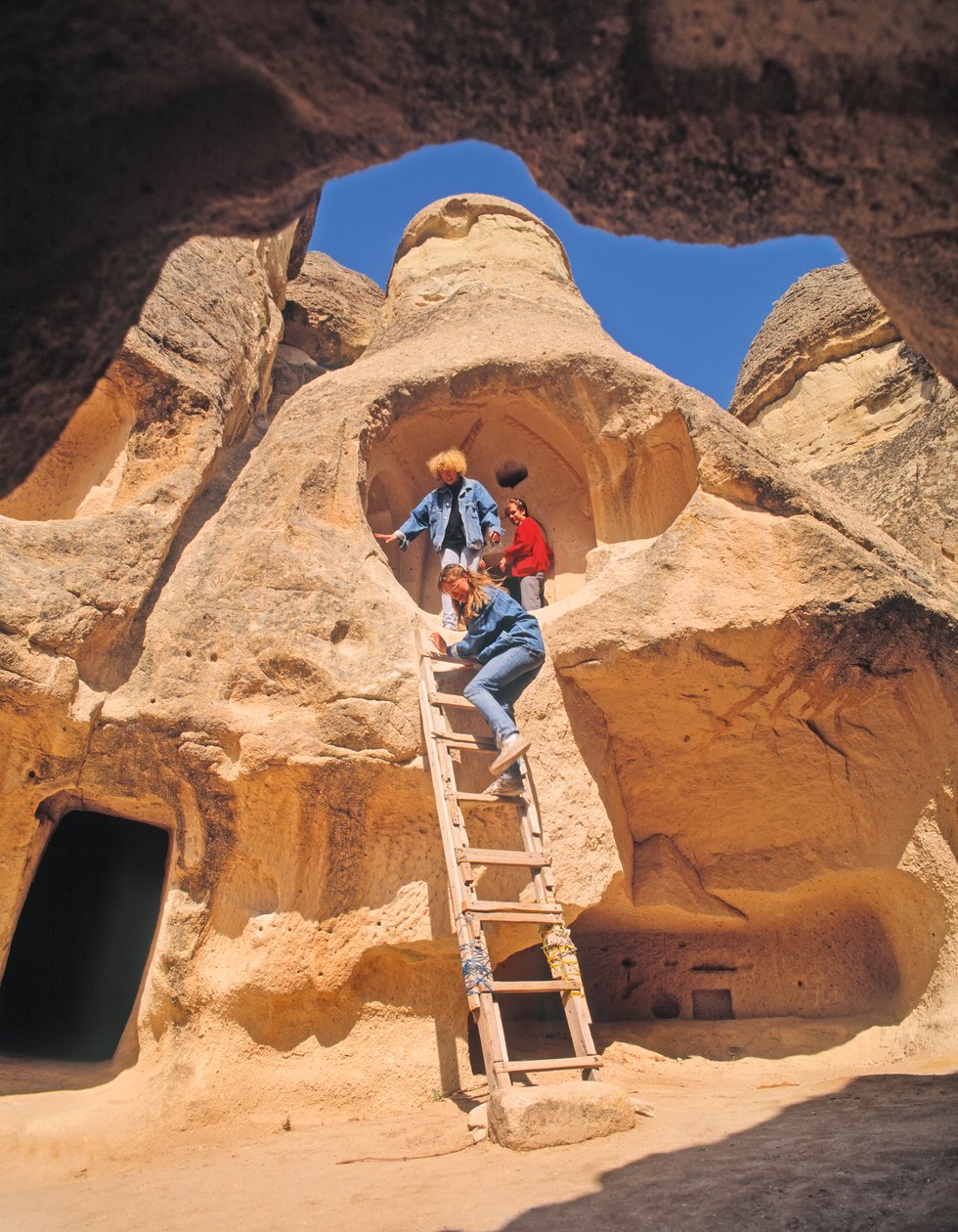 Turistas, explorando, caverna, casas de Unbekannt Unbekannt