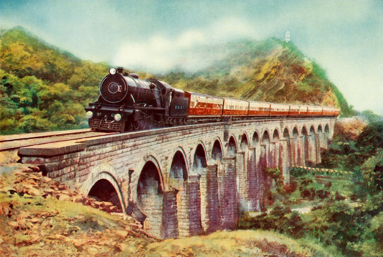 Entre Bombaim e Deli. Uma vista impressionante do Frontier Mail passando por um viaduto, 1935 de Unbekannt