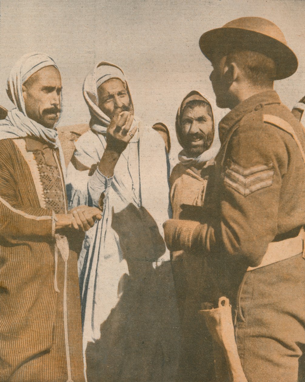 Árabes tunisinos dão as boas-vindas a um sargento britânico em Chaouach, 1943 de Unbekannt