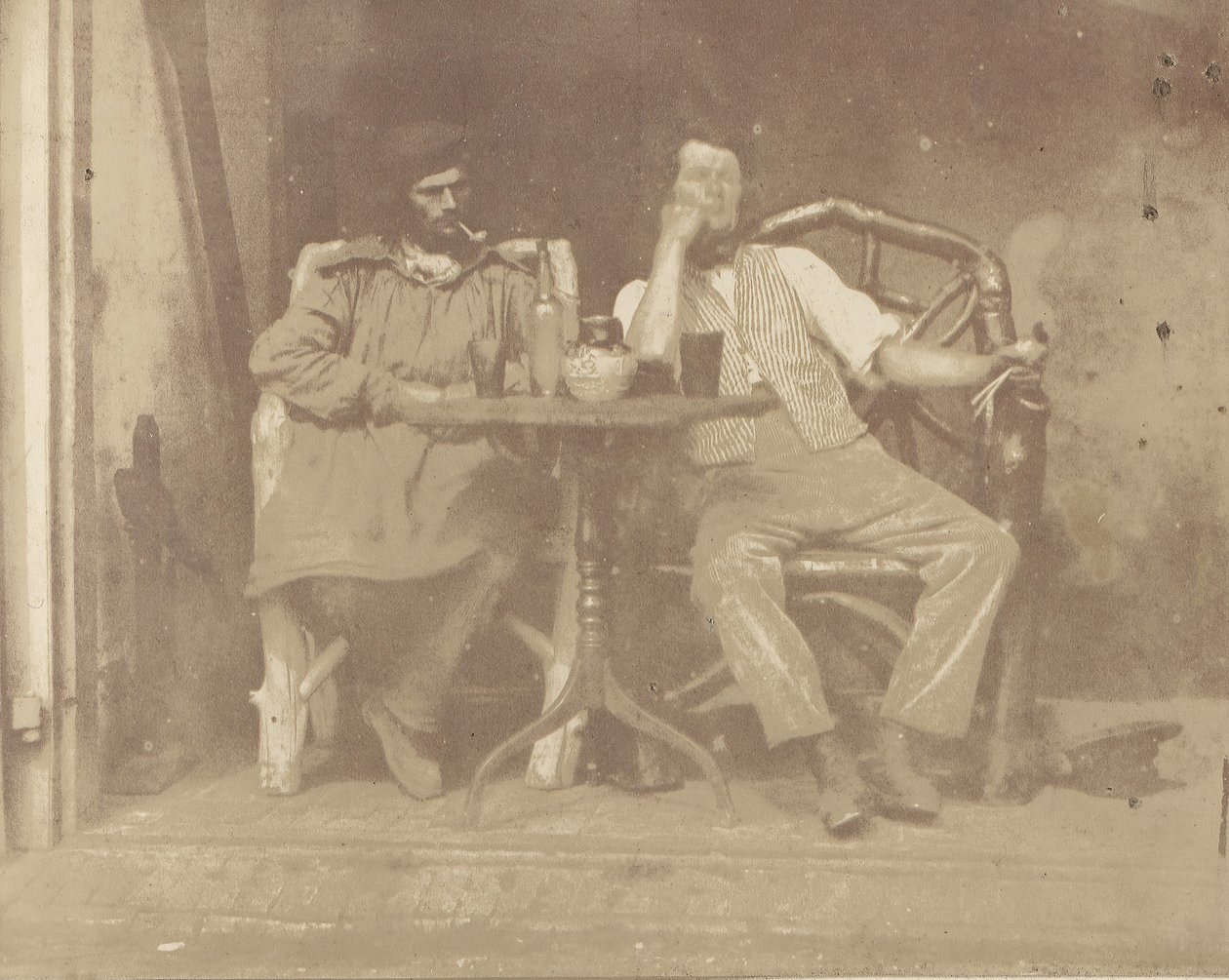 Dois homens sentados em uma mesa, década de 1850. de Unbekannt