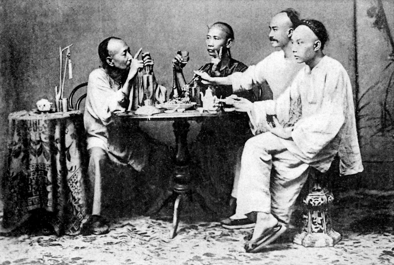 Grupo de homens sentados à mesa de Unbekannter Künstler