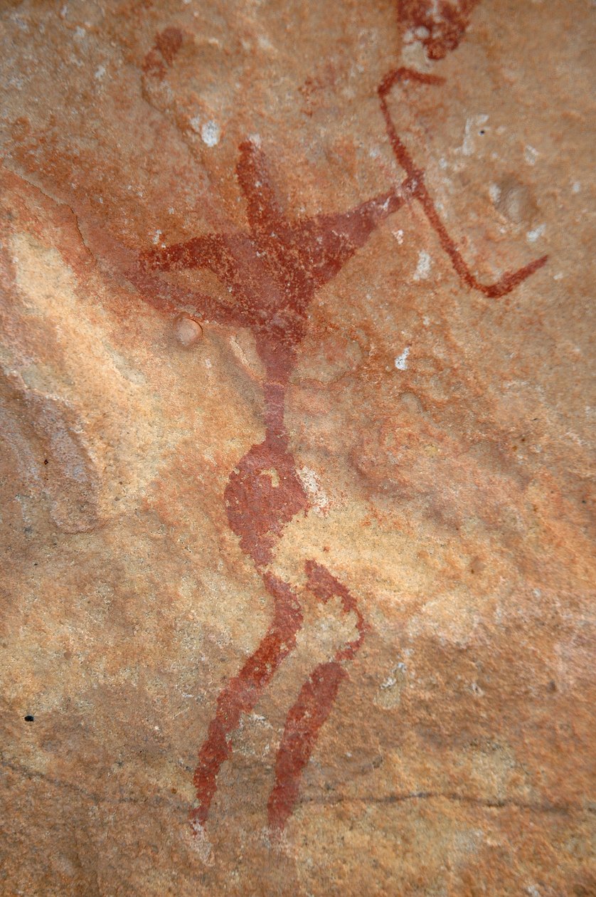 Arte rupestre, Pré-história: Pintura de uma personagem (arqueiro) num abrigo ornamentado, no maciço de Uweinat, Sudão (Karkur-Talh ou Karkur Talh). Período de 8000 a 3000 anos antes de Cristo. Fotografia de Unbekannt