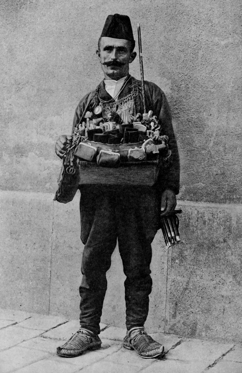 Turquia. Autolycus oriental a vender as suas mercadorias no mercado. 1920 de Unbekannt