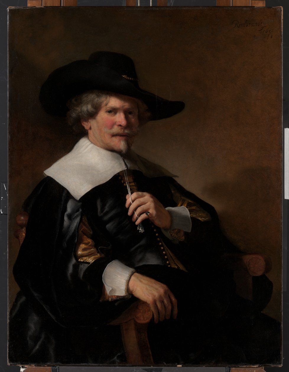 Retrato de um homem sentado em uma poltrona de Unknown