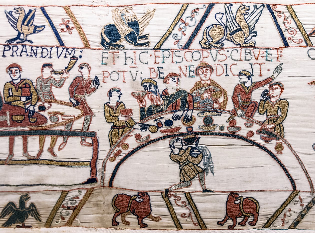 Bispo Odo abençoa a comida e o vinho, Bayeux Tapestry (bordado de lã em linho) de Unknown artist