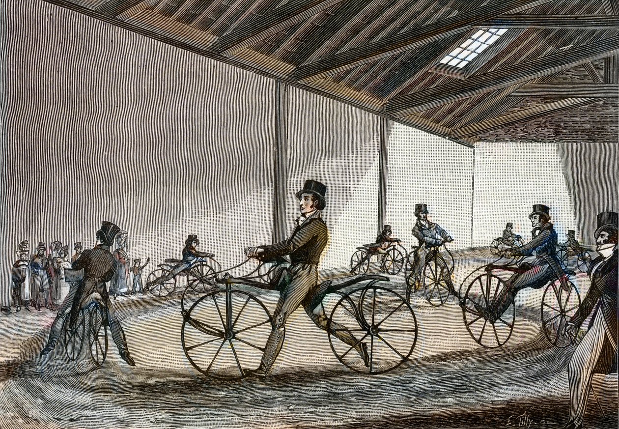 Vista interna do manège para o cavalo Hobby. Homem a conduzir bicicletas (bicicletas sem pedal, inventadas pelo Barão Karl Drais de Unknown artist
