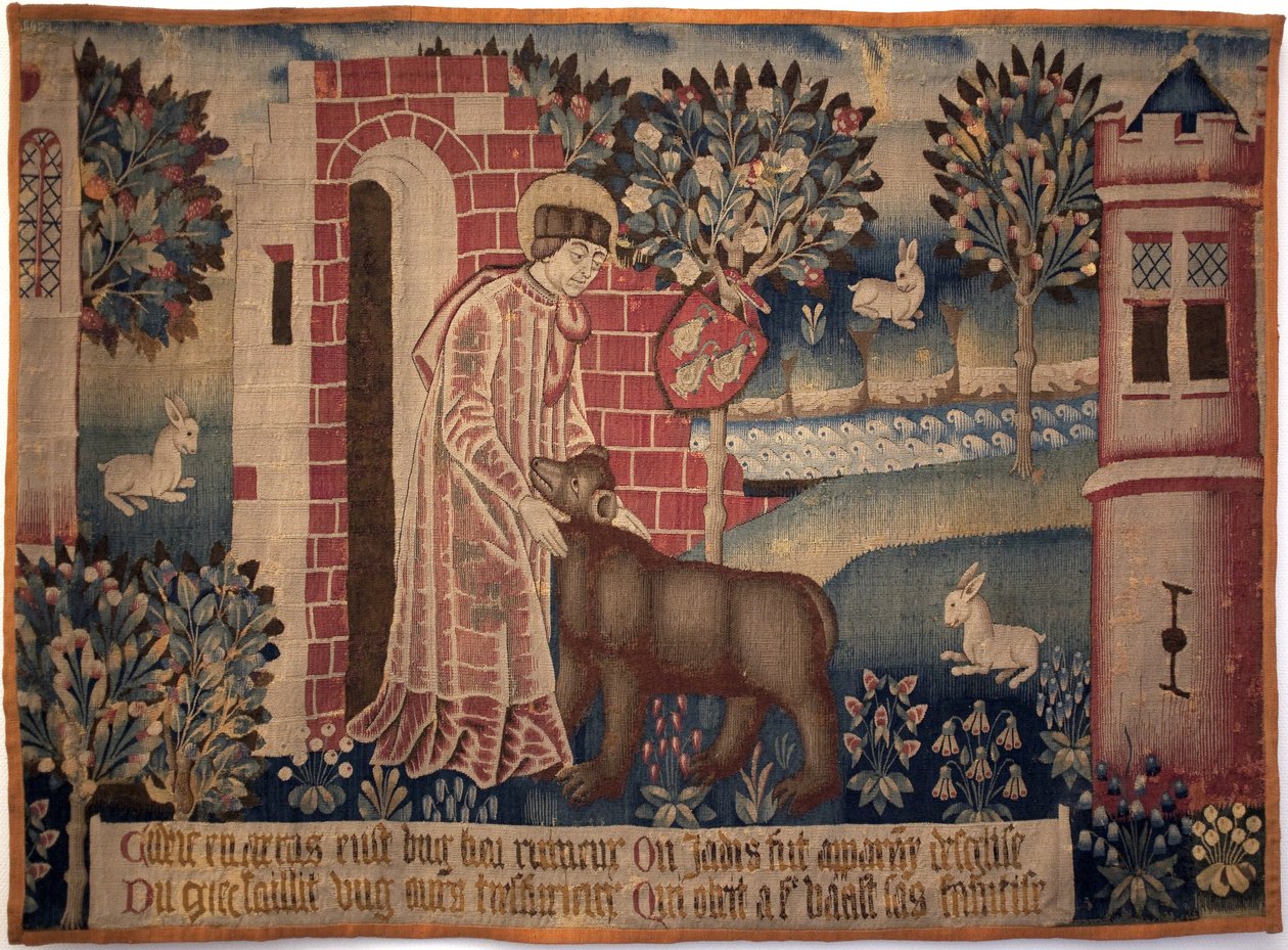 São Vaast e o Urso. São Vaast, São Vedast ou São Gaston (falecido em 540, eveque e padroeiro de Arras e sua diocese) doma o animal nas margens do rio Crinchon. Tapeçaria, segunda metade do século XV. Museu de Belas Artes de Arras de Unknown artist