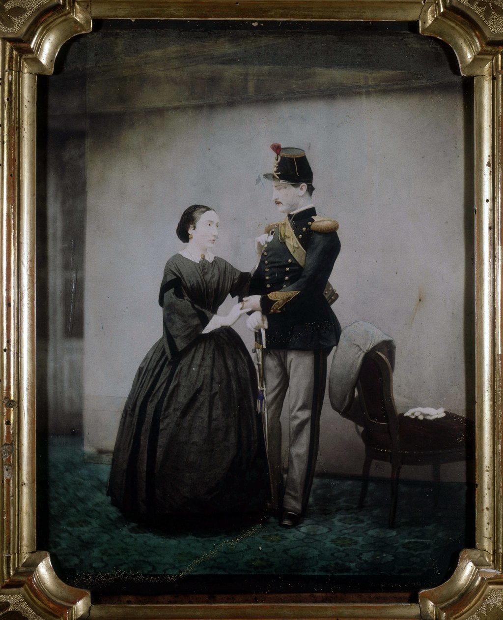 Fotografia colorida de um oficial e sua esposa datada de 1850. de Unknown photographer