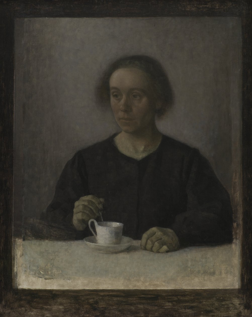 Ida Hammershøi, a esposa do artista, com uma xícara de chá de Vilhelm Hammershøi